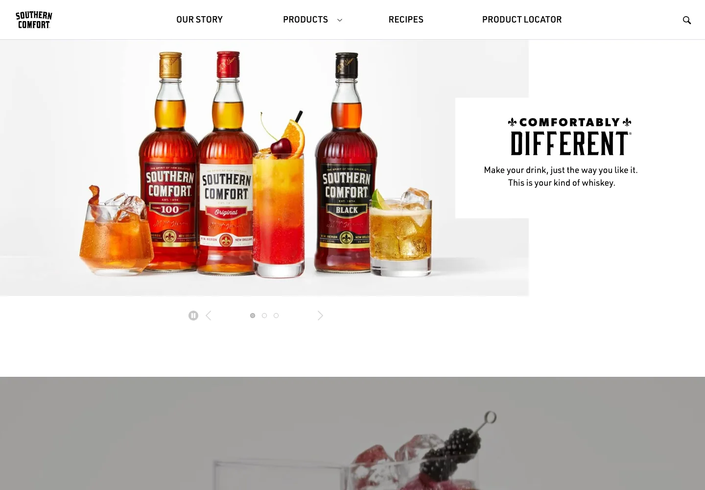 Southern Comfort homepage with whiskey bottles, cocktails, and the Comfortably Different campaign.